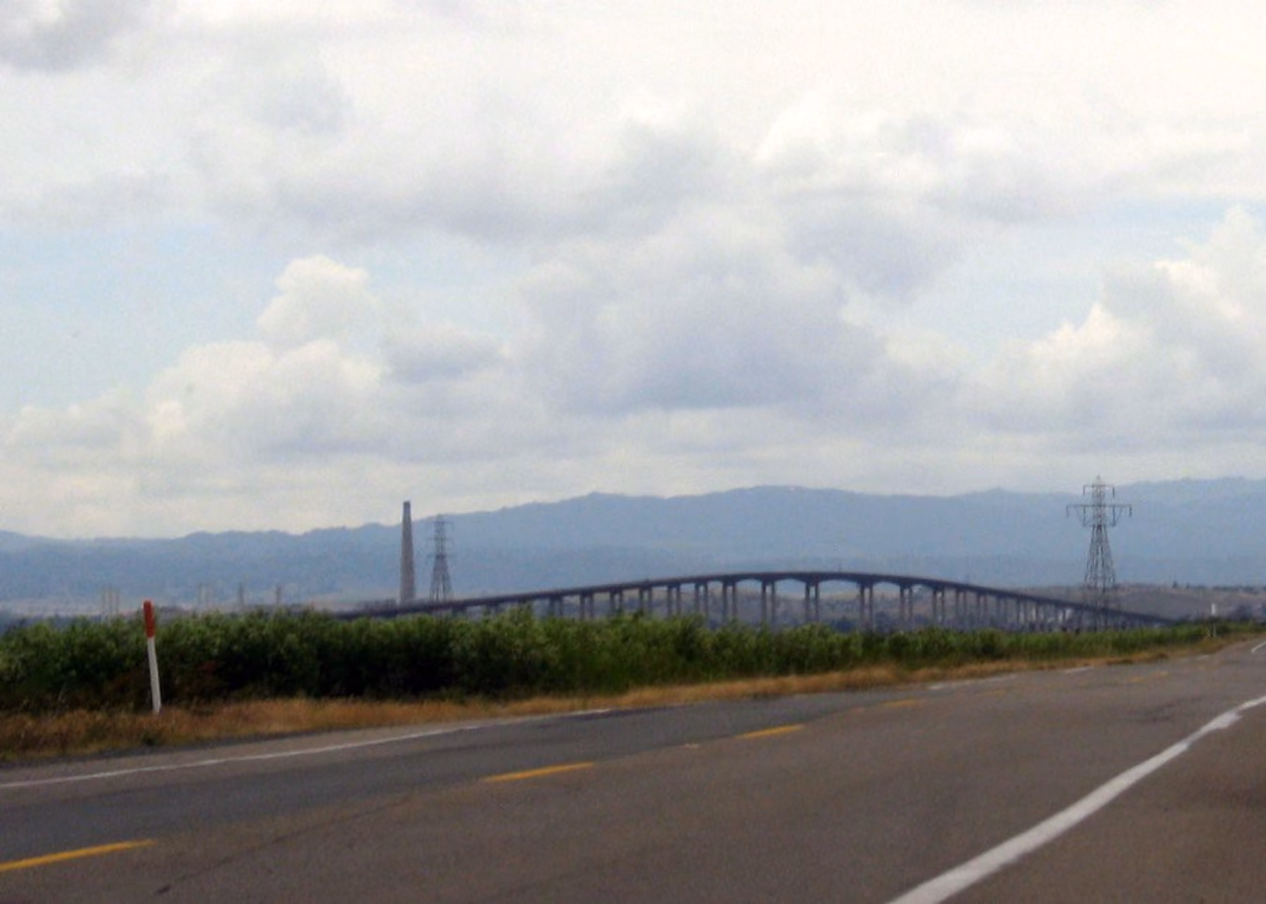 The Antioch Bridge arching over the San Joaquin River, seen from the road on the Antioch side.