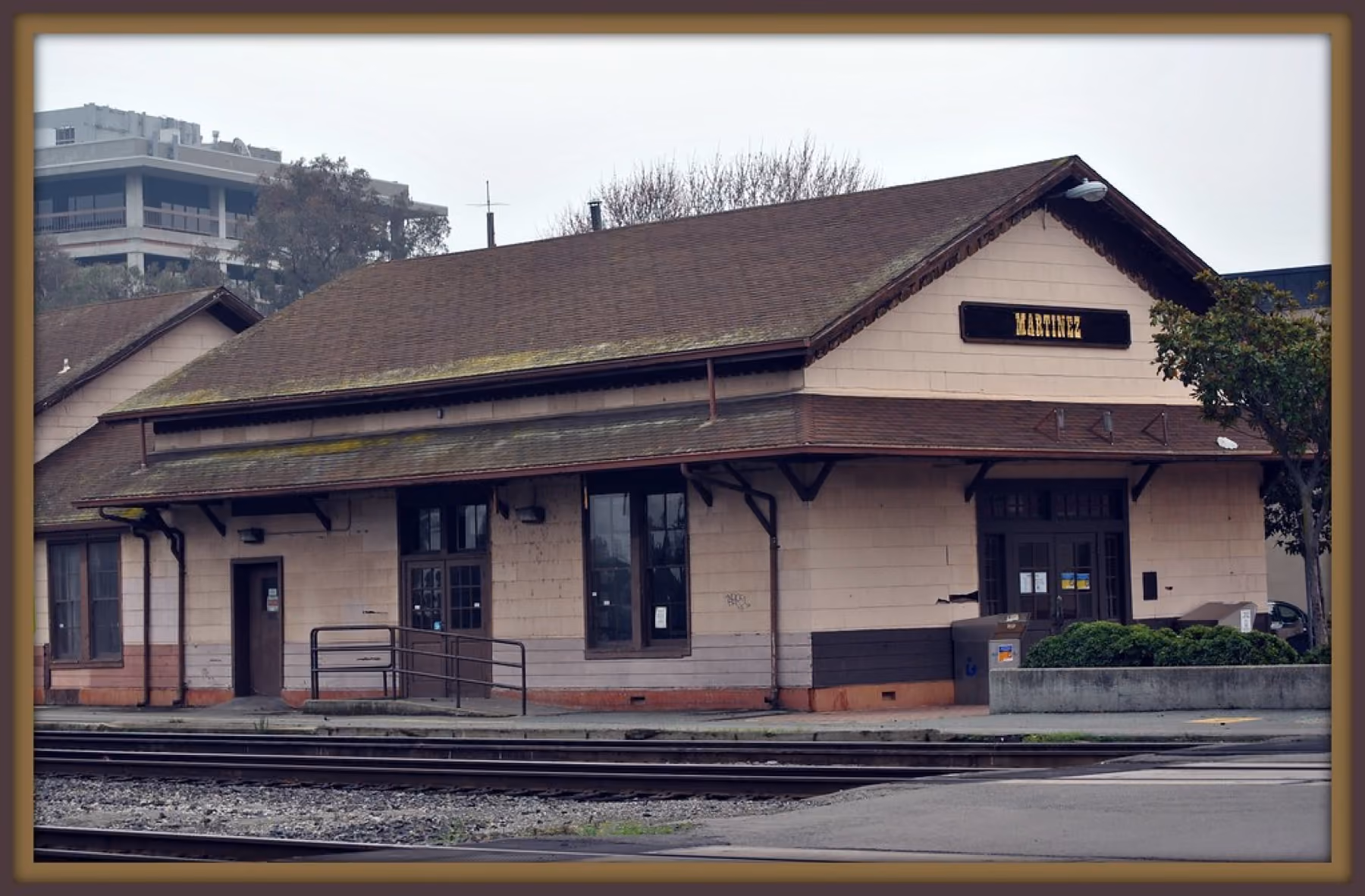 The old Southern Pacific depot building beside the tracks in Martinez.